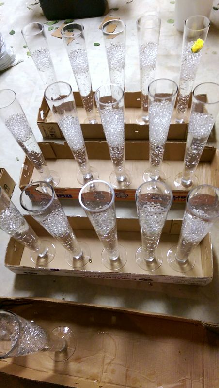 Vases filled and waiting for their centerpieces